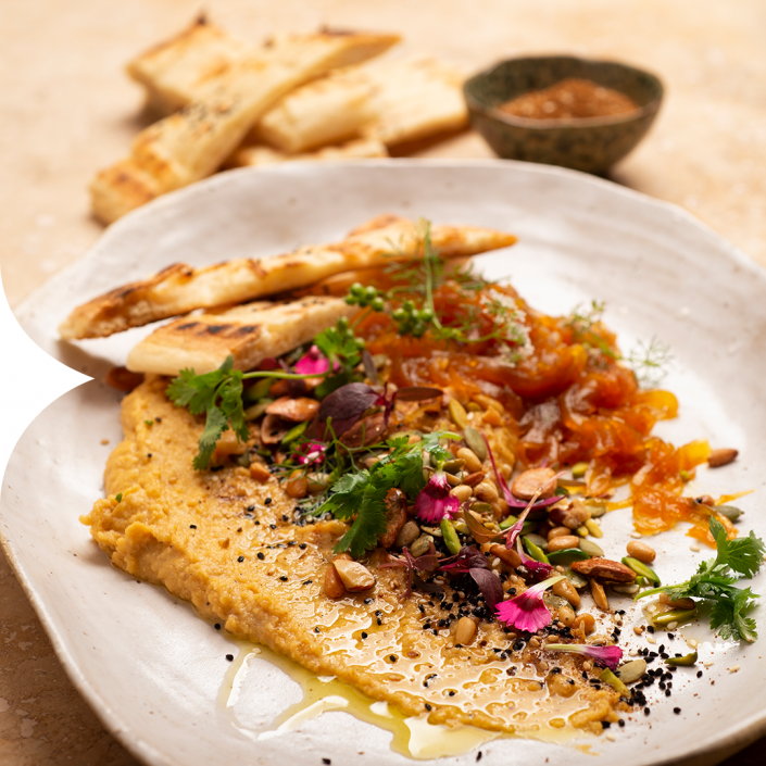 Loaded Hummus with ginger wine saffron glazed onions